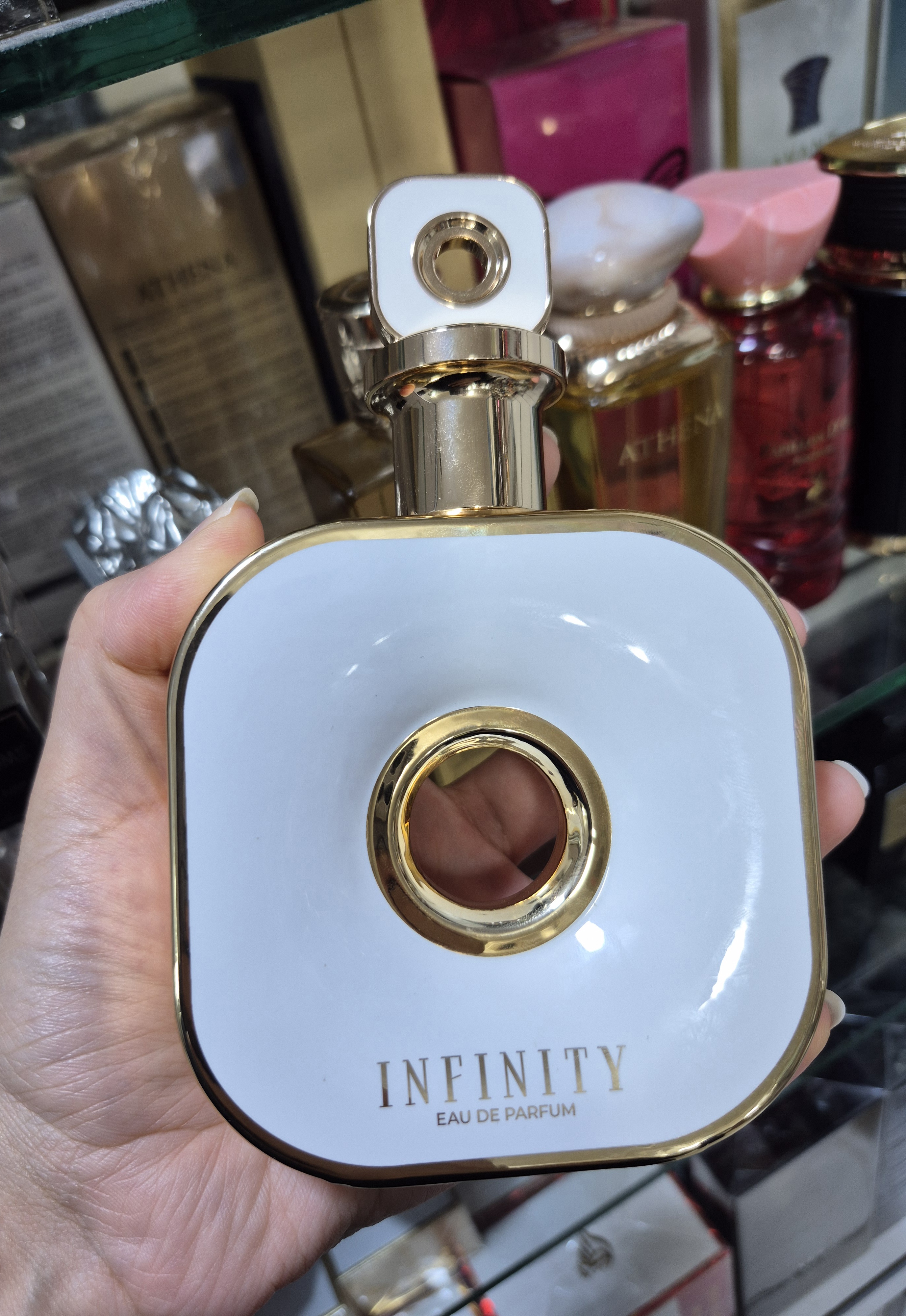 ادکلن اینفینیتی گلد آرماف زنانه(خنک و شیرین)100 میل با کیفیت تضمینی